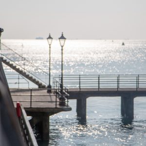 Concrete pier and stairs of the Sally Port jut in to the water